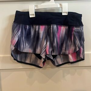 Lululemon running shorts dark purple with bright pink size 4